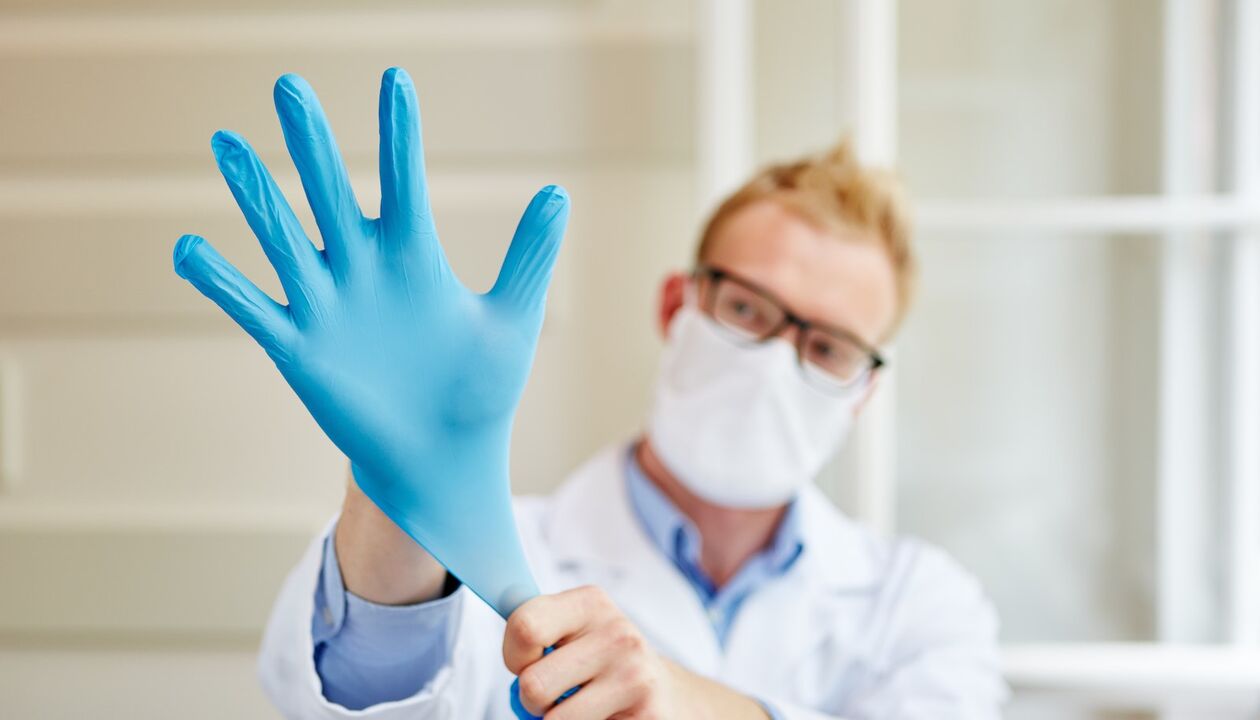 doctor wears massage glove to prevent prostatitis